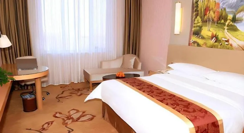 Bed in Vienna Hotel Shandong Qufu Sankong Landscape