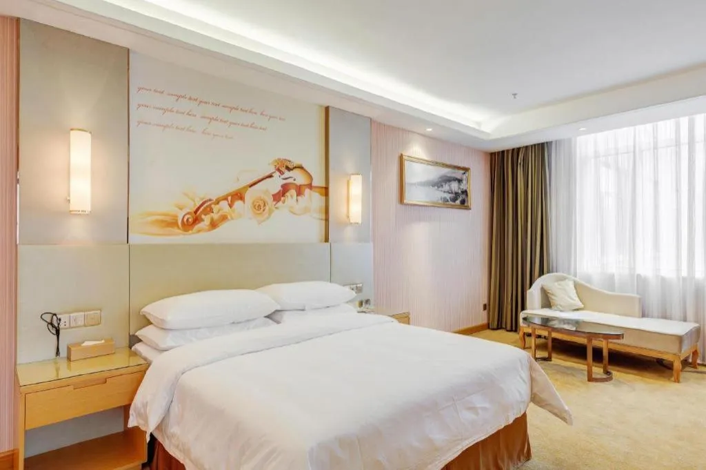 Bed in Vienna Hotel Shandong Qufu Sankong Landscape