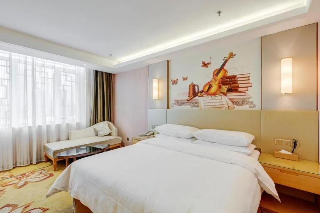 Bed in Vienna Hotel Shandong Qufu Sankong Landscape