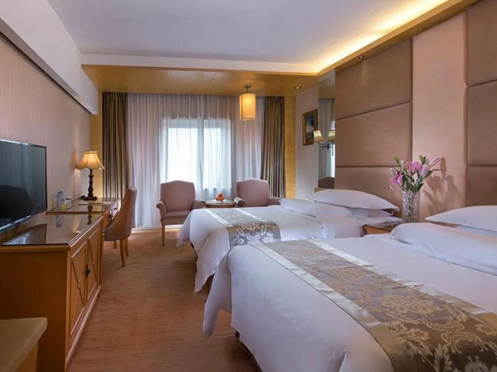 Bed in Vienna Hotel Shandong Qufu Sankong Landscape