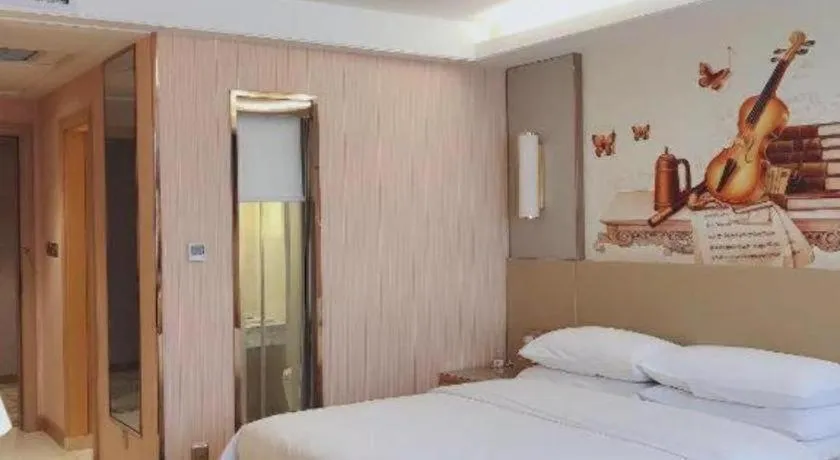 Bed in Vienna Hotel Shandong Qufu Sankong Landscape