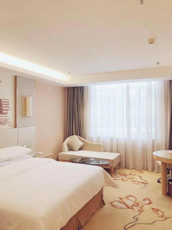 Bed in Vienna Hotel Shandong Qufu Sankong Landscape