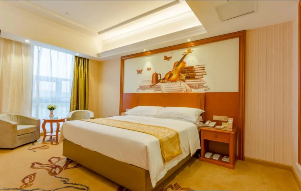 Bed in Vienna Hotel Shandong Qufu Sankong Landscape