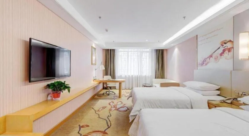 Bed in Vienna Hotel Shandong Qufu Sankong Landscape