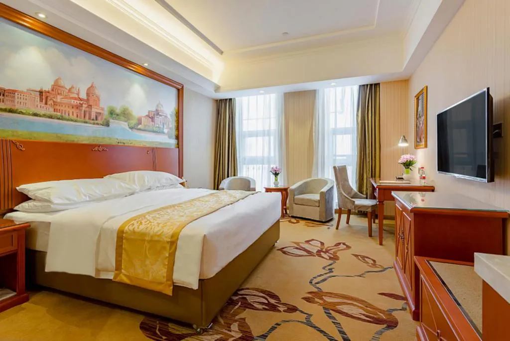 Bed in Vienna Hotel Shandong Qufu Sankong Landscape