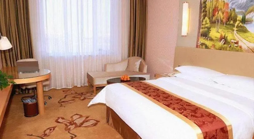 Bed in Vienna Hotel Shandong Qufu Sankong Landscape