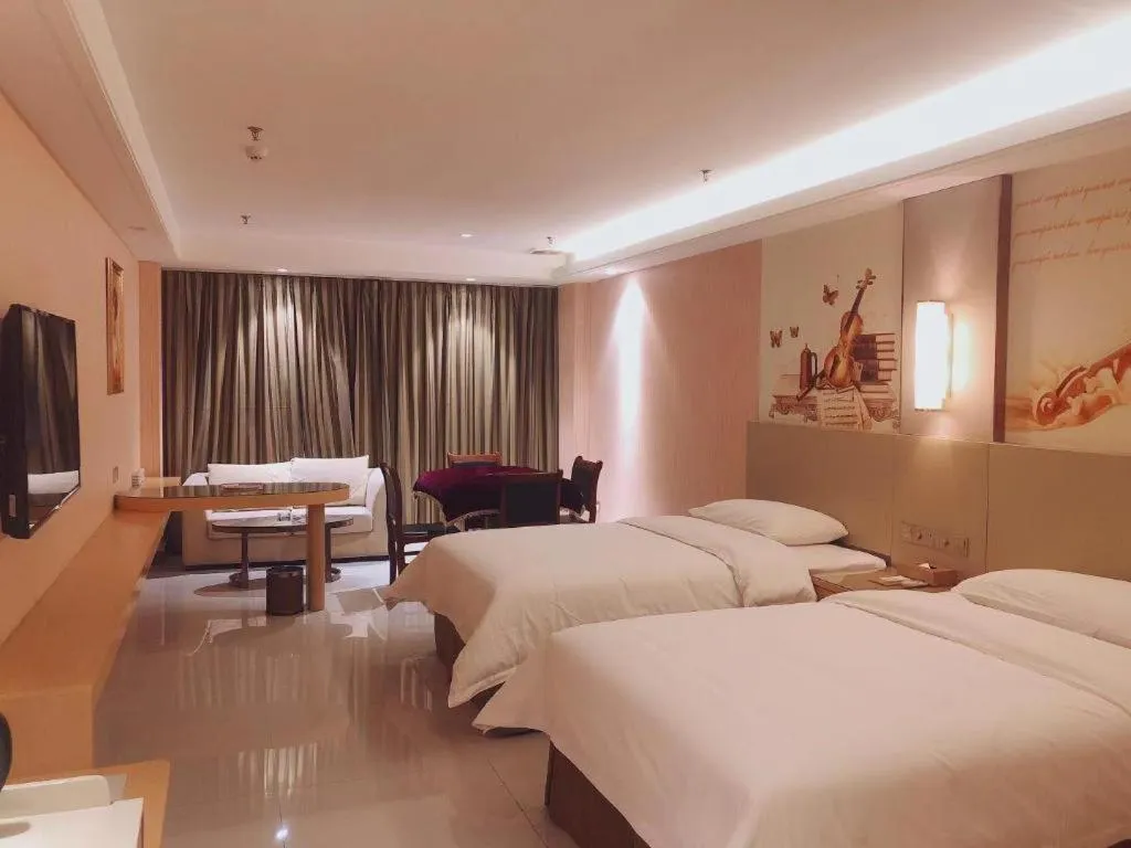 Bed in Vienna Hotel Shandong Qufu Sankong Landscape