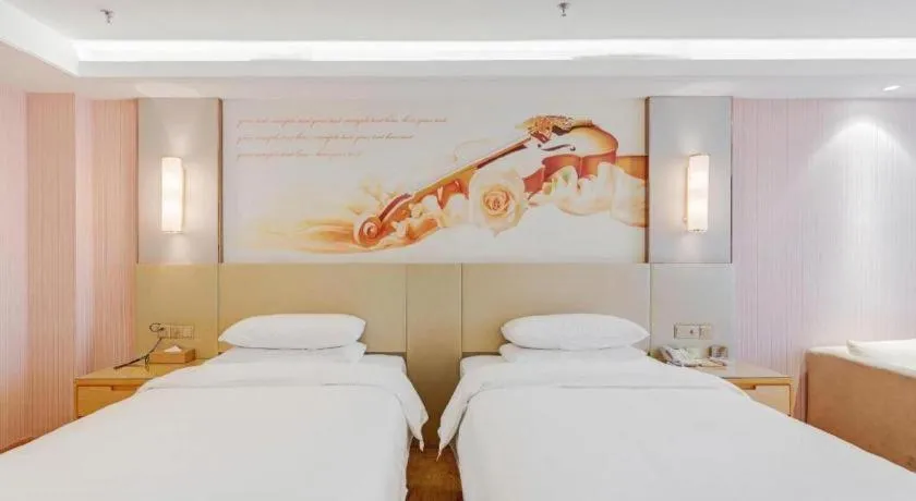 Bed in Vienna Hotel Shandong Qufu Sankong Landscape