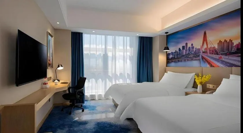 Bed in Vienna Hotel Shaanxi Hanzhong Central Square High-Speed Railway Station