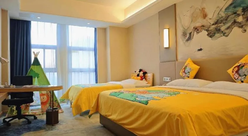 Bed in Vienna Hotel Shaanxi Hanzhong Central Square High-Speed Railway Station