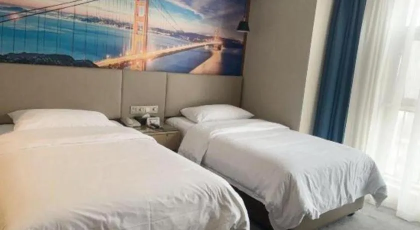 Bed in Vienna Hotel Shaanxi Hanzhong Central Square High-Speed Railway Station