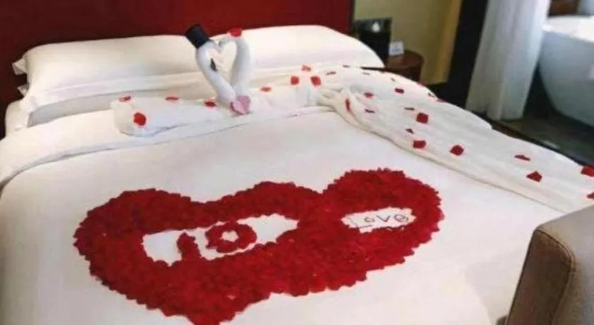 Bed in Vienna Hotel Shaanxi Hanzhong Central Square High-Speed Railway Station