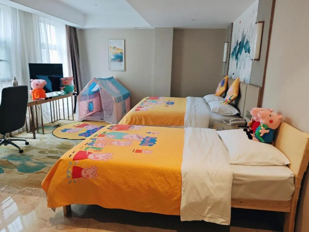 Bed in Vienna Hotel Shaanxi Hanzhong Central Square High-Speed Railway Station