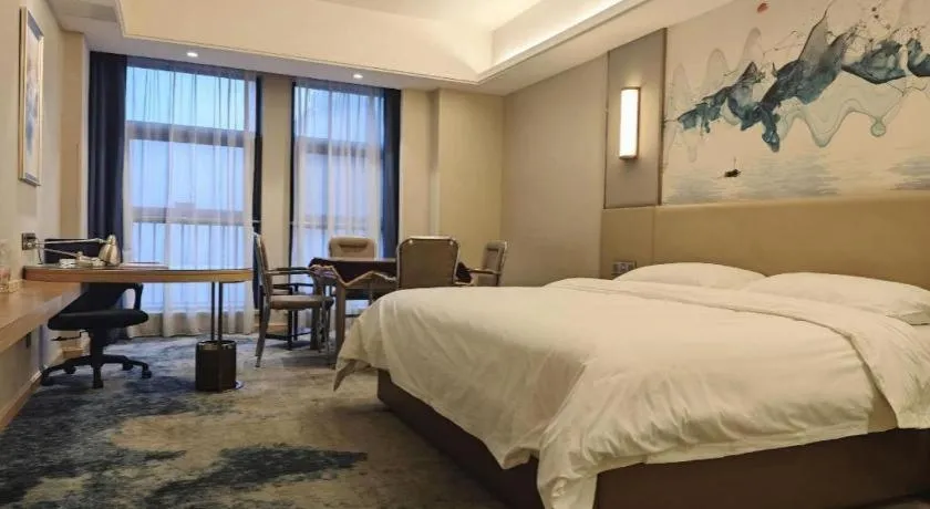 Bed in Vienna Hotel Shaanxi Hanzhong Central Square High-Speed Railway Station