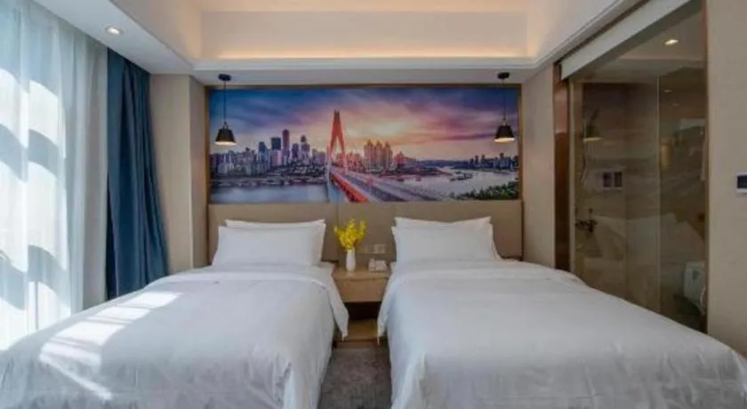 Bed in Vienna Hotel Shaanxi Hanzhong Central Square High-Speed Railway Station