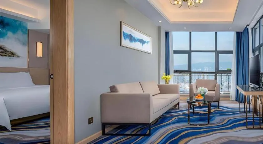 Bed in Vienna Hotel Shaanxi Hanzhong Central Square High-Speed Railway Station