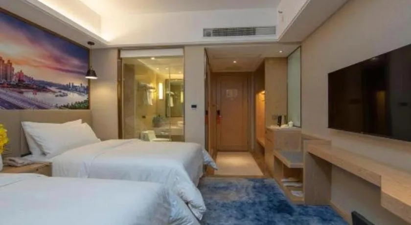 Bed in Vienna Hotel Shaanxi Hanzhong Central Square High-Speed Railway Station