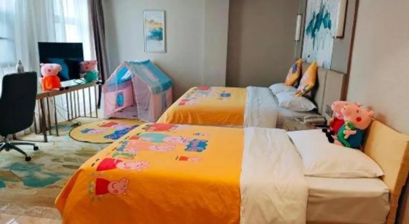 Bed in Vienna Hotel Shaanxi Hanzhong Central Square High-Speed Railway Station