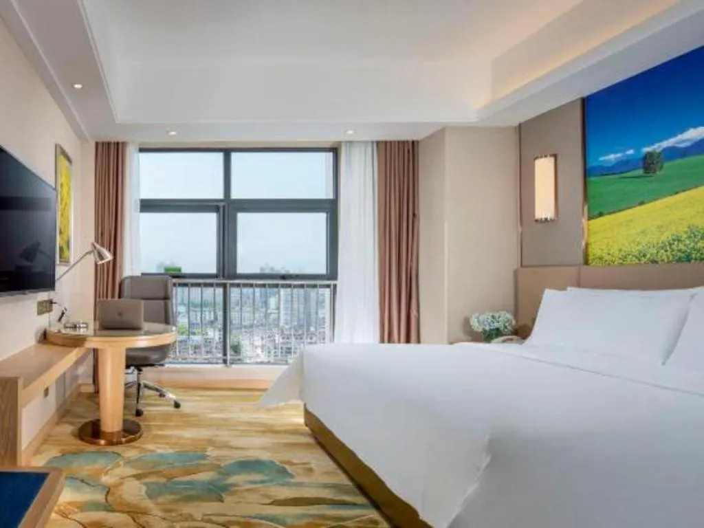 Bed in Vienna Hotel Shaanxi Hanzhong Central Square High-Speed Railway Station