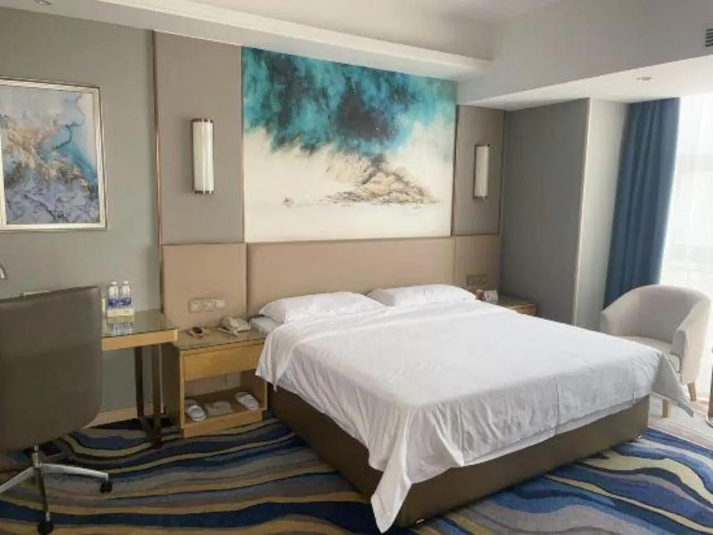 Bed in Vienna Hotel Shaanxi Hanzhong Central Square High-Speed Railway Station