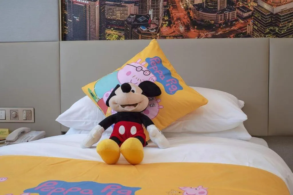 Bed in Vienna Hotel Shaanxi Hanzhong Central Square High-Speed Railway Station