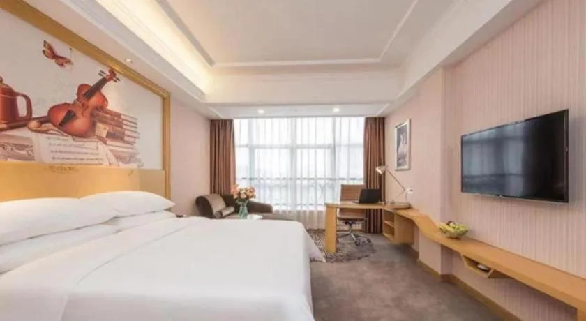 Bed in Vienna Hotel Guangzhou North Station Huaguoshan Metro Station