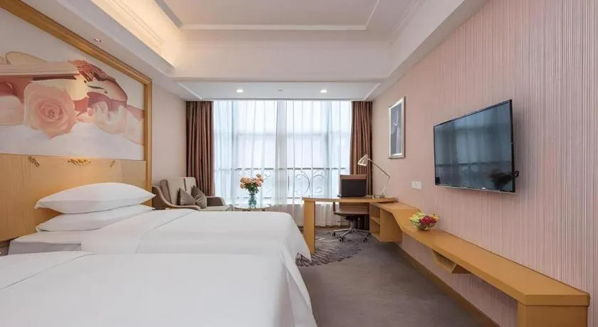 Bed in Vienna Hotel Guangzhou North Station Huaguoshan Metro Station
