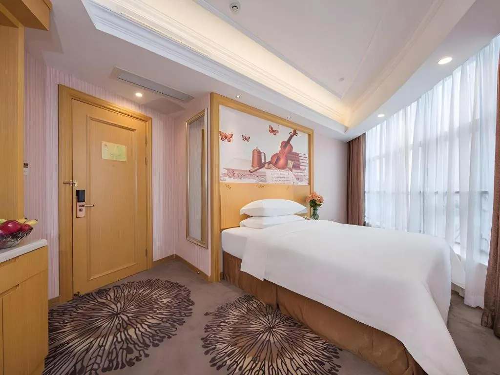 Bed in Vienna Hotel Guangzhou North Station Huaguoshan Metro Station
