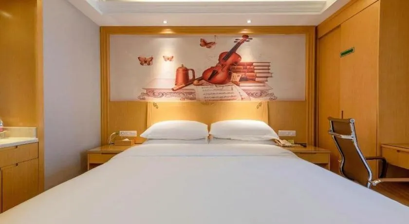 Bed in Vienna Hotel Guangzhou North Station Huaguoshan Metro Station