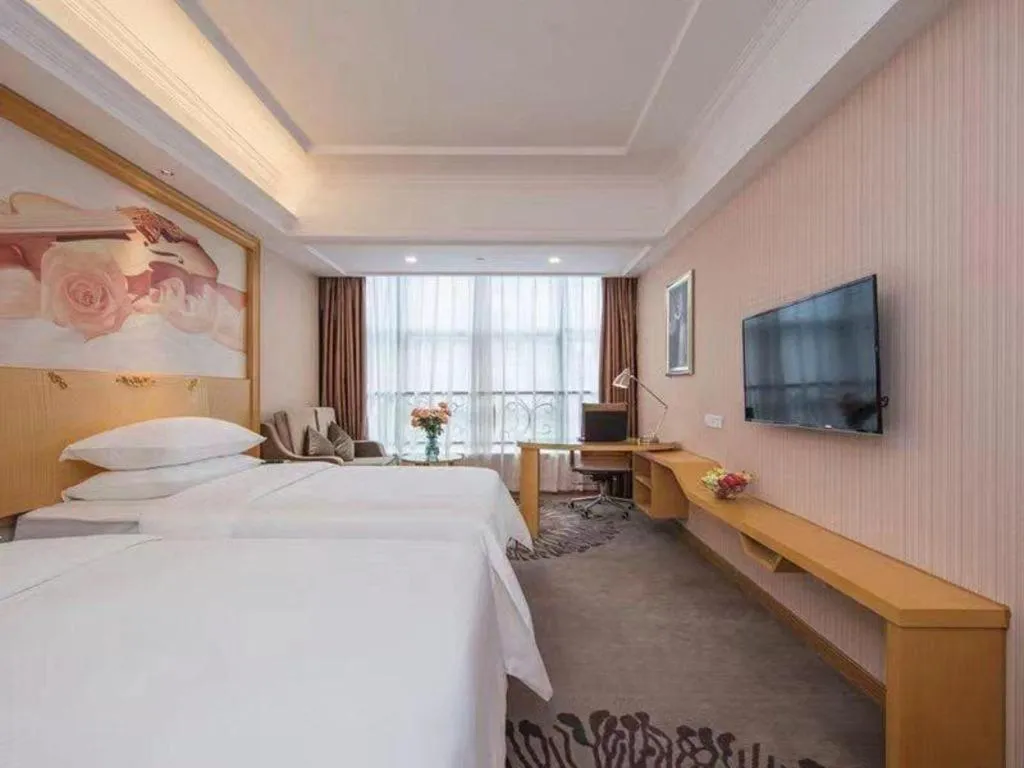 Bed in Vienna Hotel Guangzhou North Station Huaguoshan Metro Station