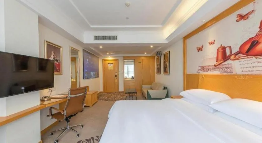 Bed in Vienna Hotel Guangzhou North Station Huaguoshan Metro Station