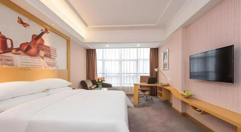 Bed in Vienna Hotel Guangzhou North Station Huaguoshan Metro Station