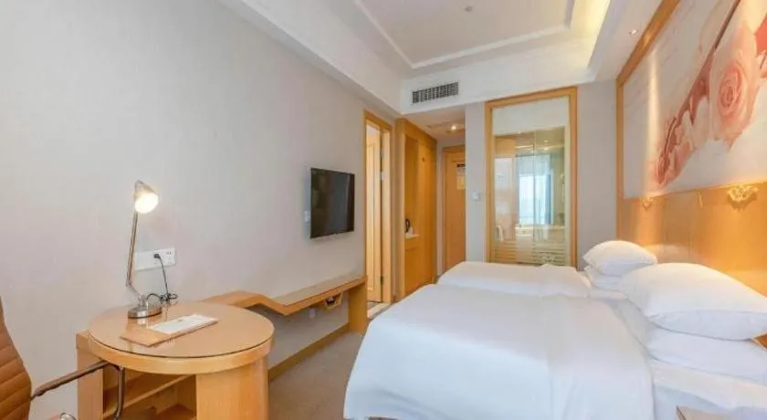 Bed in Vienna Hotel Guangzhou North Station Huaguoshan Metro Station