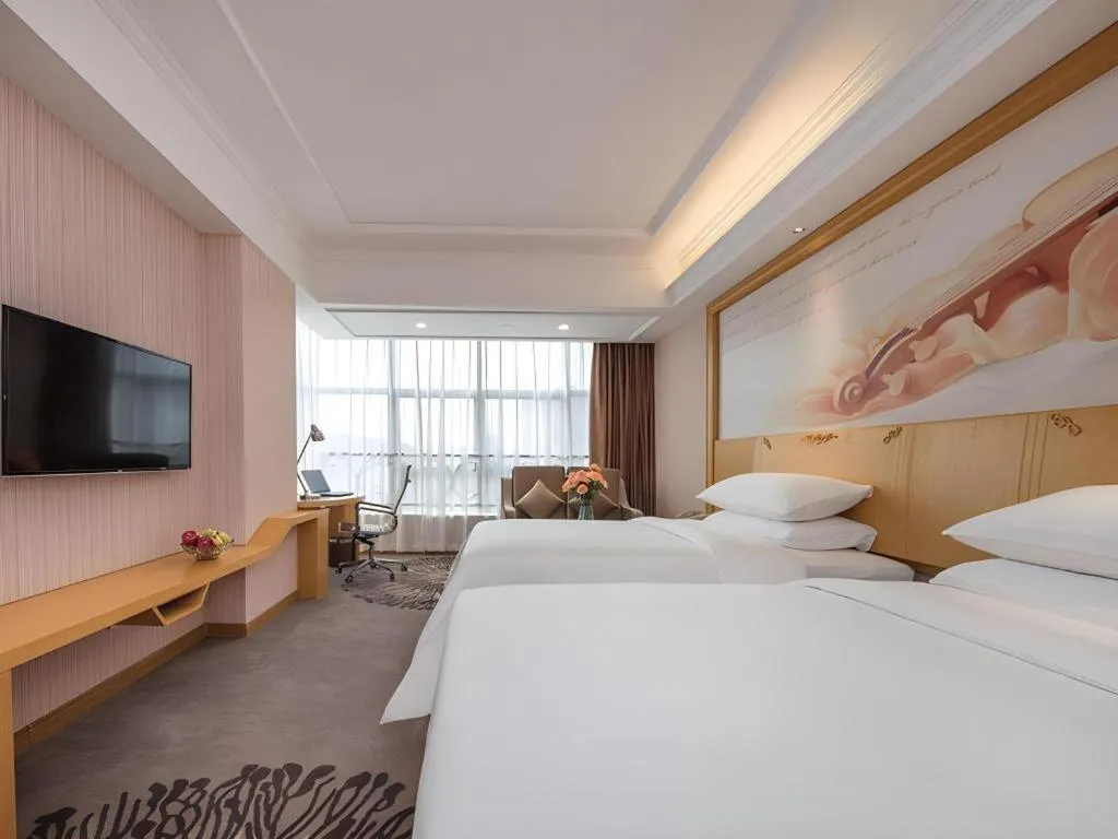 Bed in Vienna Hotel Guangzhou North Station Huaguoshan Metro Station