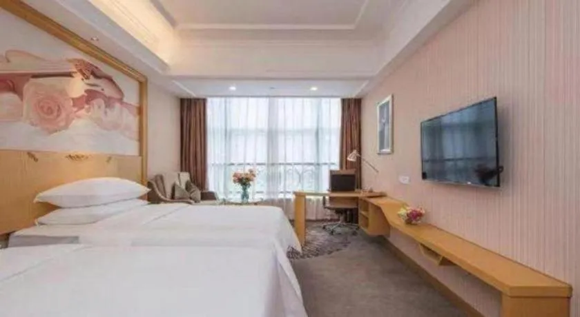Bed in Vienna Hotel Guangzhou North Station Huaguoshan Metro Station