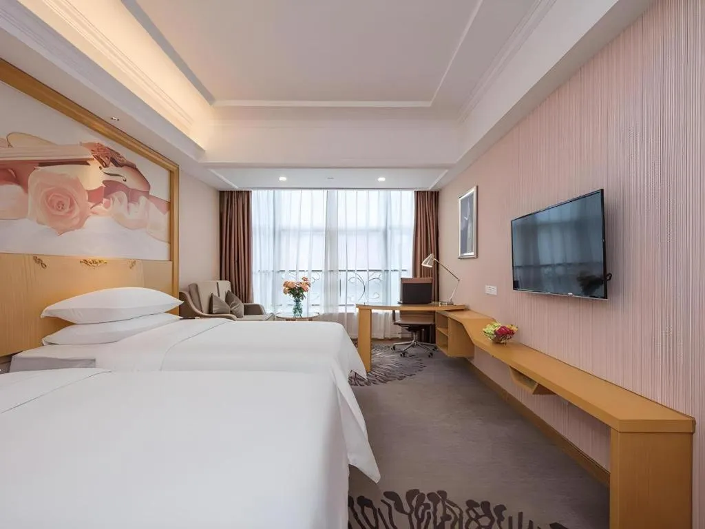 Bed in Vienna Hotel Guangzhou North Station Huaguoshan Metro Station