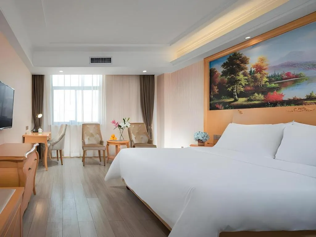 Bed in Vienna Hotel Shaanxi Ankang Jiangnan