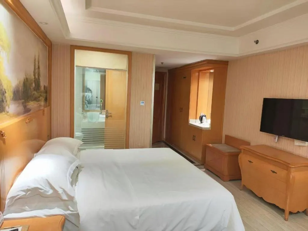 Bed in Vienna Hotel Shaanxi Ankang Jiangnan