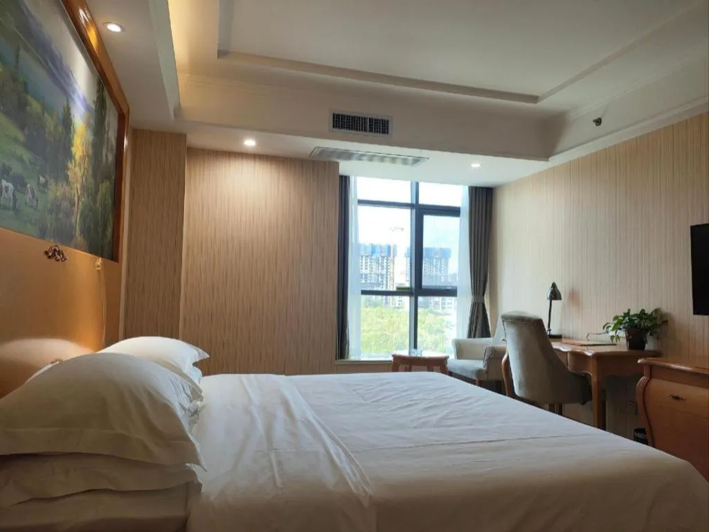 Bed in Vienna Hotel Shaanxi Ankang Jiangnan