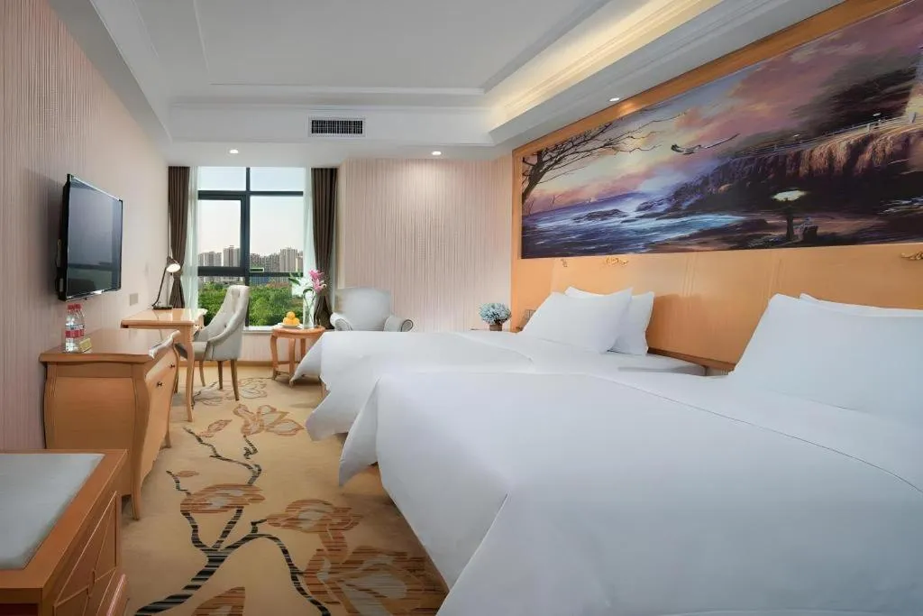 Bed in Vienna Hotel Shaanxi Ankang Jiangnan