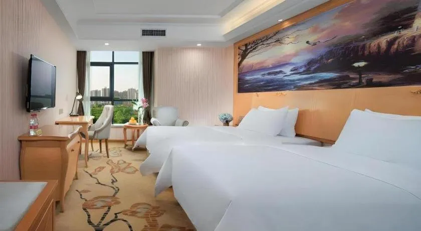 Bed in Vienna Hotel Shaanxi Ankang Jiangnan