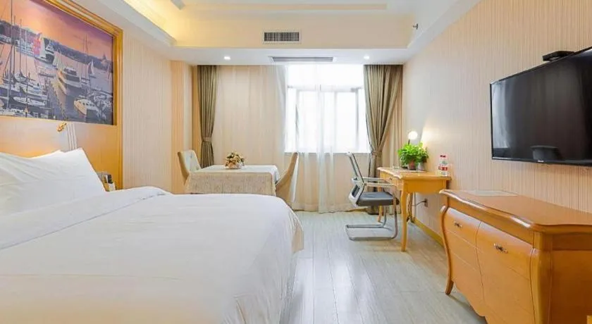 Bed in Vienna Hotel Shaanxi Ankang Jiangnan