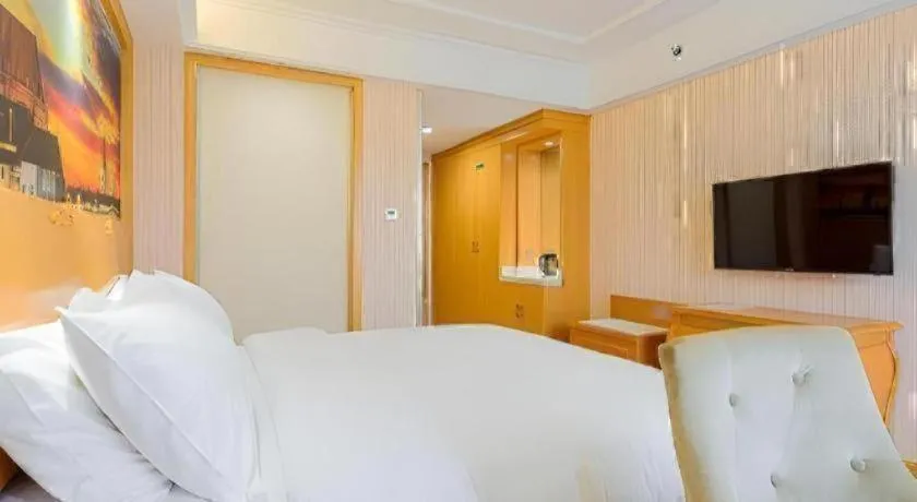 Bed in Vienna Hotel Shaanxi Ankang Jiangnan