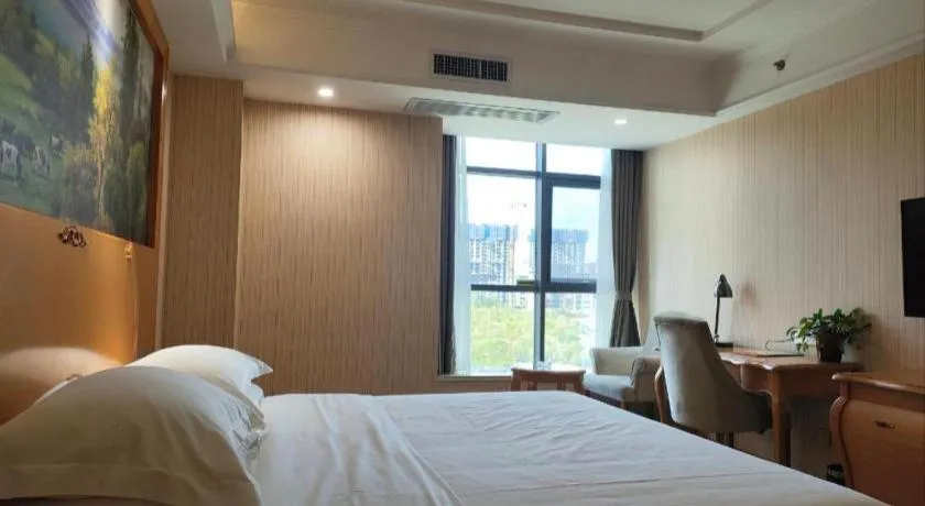 Bed in Vienna Hotel Shaanxi Ankang Jiangnan