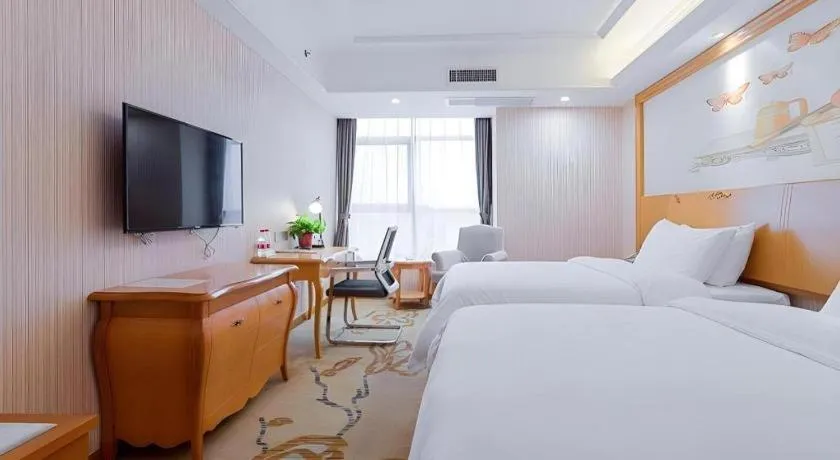 Bed in Vienna Hotel Shaanxi Ankang Jiangnan