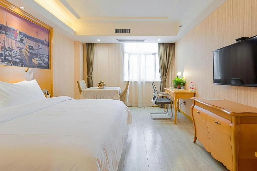 Bed in Vienna Hotel Shaanxi Ankang Jiangnan