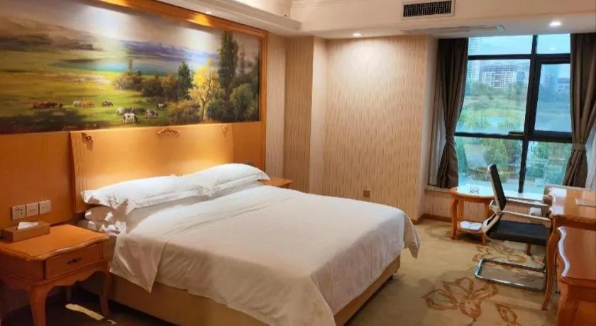 Bed in Vienna Hotel Shaanxi Ankang Jiangnan