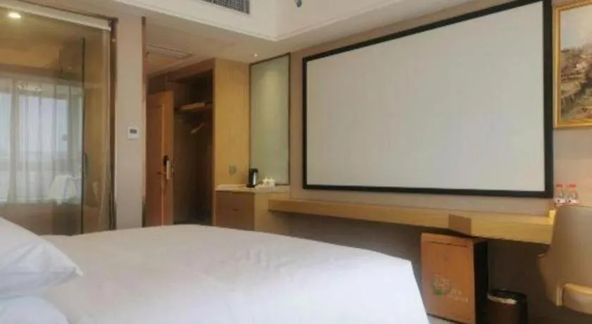 Bed in Vienna Hotel Guangdong Zhongshan South Area Passenger Station