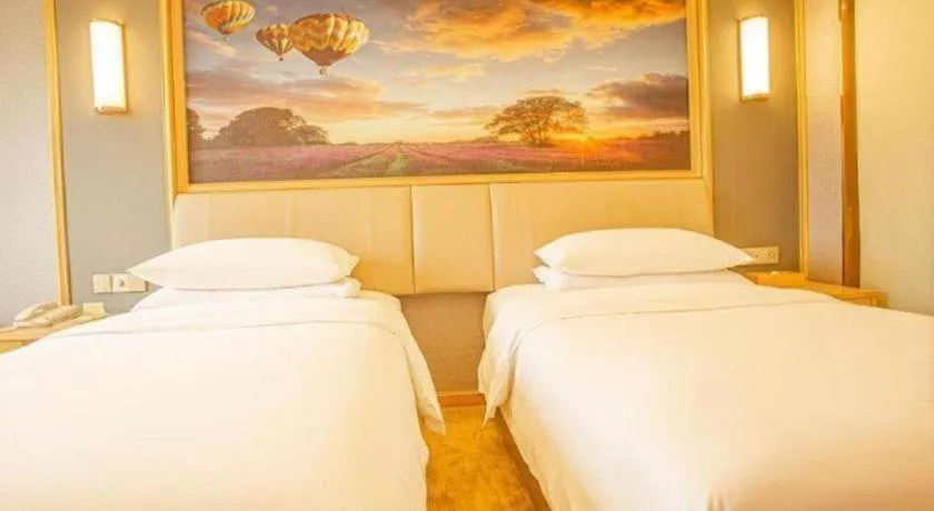 Bed in Vienna Hotel Guangdong Zhongshan South Area Passenger Station