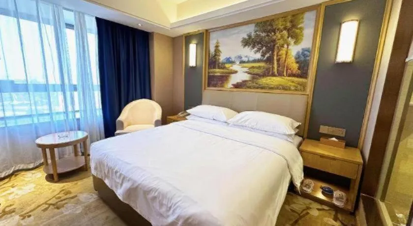 Bed in Vienna Hotel Guangdong Zhongshan South Area Passenger Station